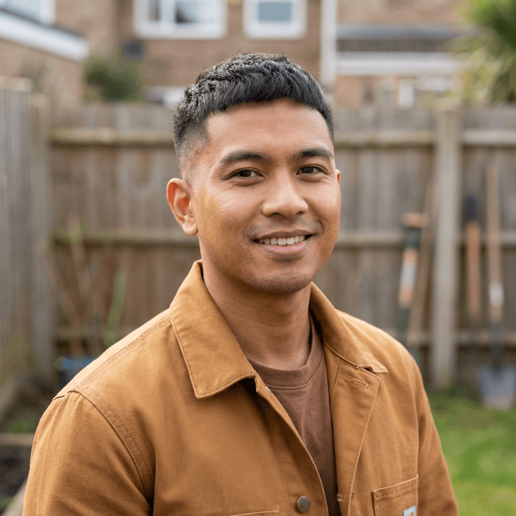 Male customer in his late 30s, Black, easygoing practical appearance typical of repeat customer